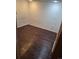 Bedroom with hardwood floors and electrical outlet at 2750 S Rifle St, Aurora, CO 80013