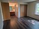 Spacious bedroom with wood floors and a bathroom and closet in view at 2750 S Rifle St, Aurora, CO 80013