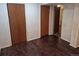 Bedroom with hardwood floors and two closets and room to add more storage at 2750 S Rifle St, Aurora, CO 80013