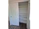 A closet with sliding doors and built-in shelving provides ample storage at 2750 S Rifle St, Aurora, CO 80013