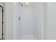 White shower with built in seat at 19257 E Legend Ave, Parker, CO 80134