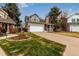 Inviting exterior view of a well-kept home, featuring an attached garage and a neatly landscaped front yard at 19257 E Legend Ave, Parker, CO 80134