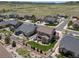 Aerial view of neighborhood with well-maintained lawns, fencing and neighborhood streets at 6065 Clover Ridge Cir, Castle Rock, CO 80104