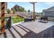 Inviting backyard deck perfect for outdoor entertaining with views of the landscaped yard at 6065 Clover Ridge Cir, Castle Rock, CO 80104