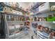 Organized walk-in pantry featuring wire shelving and ample storage space for food and supplies at 6065 Clover Ridge Cir, Castle Rock, CO 80104