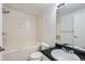Well-maintained bathroom features a tub, shower combination and classic fixtures at 2488 S Victor St # E, Aurora, CO 80014