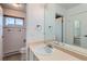 Clean bathroom with modern fixtures, bright lighting, and sleek design at 2488 S Victor St # E, Aurora, CO 80014