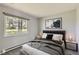 Comfortable bedroom with a large window for natural light and a neutral color palette at 2488 S Victor St # E, Aurora, CO 80014
