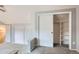 Open bedroom with closet and shelving featuring ample space and storage at 2488 S Victor St # E, Aurora, CO 80014