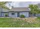 Inviting home featuring manicured lawn, with a walkway leading to the front door at 2488 S Victor St # E, Aurora, CO 80014