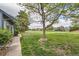 Scenic view of lush green golf course and distant apartment building from the property at 2488 S Victor St # E, Aurora, CO 80014