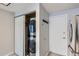 Convenient laundry area features a stacked washer and dryer for space-saving efficiency at 2488 S Victor St # E, Aurora, CO 80014