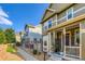 Charming two-story home featuring a well-maintained yard and inviting front porch at 14641 E Poundstone Dr, Aurora, CO 80015