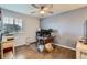 Home office with hardwood floors and lots of natural light at 14641 E Poundstone Dr, Aurora, CO 80015