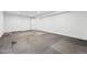 Unfinished basement featuring concrete floors and white walls at 25077 E Canal Pl, Aurora, CO 80018