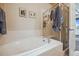 Bathroom with shower and tub, updated finishes at 25077 E Canal Pl, Aurora, CO 80018