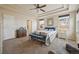 Spacious main bedroom with ceiling fan and ample natural light at 25077 E Canal Pl, Aurora, CO 80018
