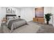 Cozy bedroom featuring neutral decor, a comfortable bed, and stylish accents at 25077 E Canal Pl, Aurora, CO 80018
