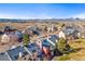 Aerial view of the community with mountain views at 9477 W Ontario Dr, Littleton, CO 80128