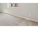 Neutral bedroom with wall to wall carpet and natural light entering through the window at 7244 Arkansas St, Frederick, CO 80530