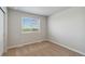Bright bedroom features large window and neutral carpet at 7244 Arkansas St, Frederick, CO 80530