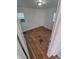This bedroom has wood flooring and a window with natural light at 1266 Del Mar Pkwy, Aurora, CO 80010