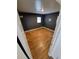 This bedroom has dark gray walls, wood flooring and a window at 1266 Del Mar Pkwy, Aurora, CO 80010