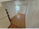 Bonus room with hardwood floors and a bright window at 1266 Del Mar Pkwy, Aurora, CO 80010