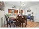 Elegant dining room that flows into the kitchen, with an open concept design at 6462 E Bates Ave, Denver, CO 80222