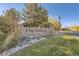 Stone entrance sign for The Preserve community at 10437 W Hampden Ave # 202, Lakewood, CO 80227