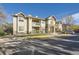 Attractive exterior of a two-story building with landscaping and parking at 10437 W Hampden Ave # 202, Lakewood, CO 80227