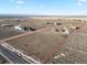 Large lot with house and barn visible from above at 14219 County Road 22, Fort Lupton, CO 80621