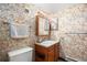 Small bathroom featuring floral wallpaper, a single sink vanity and mirror cabinet at 14740 E Kentucky Dr # 716, Aurora, CO 80012