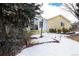 Backyard with snow and landscaping at 6926 S Saulsbury St, Littleton, CO 80128