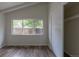 Bedroom with large window and closet at 7042 W 76Th Ave, Arvada, CO 80003