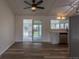 Updated kitchen area with stainless steel appliances and sliding glass doors at 7042 W 76Th Ave, Arvada, CO 80003