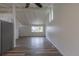 Open concept floor plan with kitchen area flowing into the living room at 7042 W 76Th Ave, Arvada, CO 80003