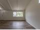 Inviting living room area with great natural light and fresh paint at 7042 W 76Th Ave, Arvada, CO 80003