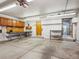 Spacious garage with built-in wooden shelves and ample storage space at 423 Empire St, Aurora, CO 80010
