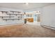 Open living room featuring open shelving and an island into the kitchen at 423 Empire St, Aurora, CO 80010