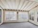 A sun room featuring multiple windows and a white ceiling providing lots of natural light at 423 Empire St, Aurora, CO 80010