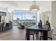 Open concept living space featuring floor to ceiling windows, modern decor and stainless steel appliances at 2001 Lincoln St # 1822, Denver, CO 80202