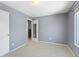 Light-filled bedroom with closet and open door offers a tranquil retreat at 430 Chestnut Way, Broomfield, CO 80020