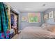 Comfortable bedroom with closet offers a private and relaxing sanctuary at 430 Chestnut Way, Broomfield, CO 80020