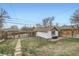 Spacious backyard featuring a brick garage and wood fence at 3384 W 29Th Ave, Denver, CO 80211