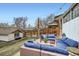 Backyard patio area featuring wicker couches with blue cushions at 3384 W 29Th Ave, Denver, CO 80211