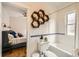 Updated bathroom boasts subway tile, blue accents, and stylish fixtures at 3384 W 29Th Ave, Denver, CO 80211