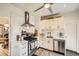 Modern kitchen featuring stainless steel appliances, white cabinetry, and subway tile backsplash at 3384 W 29Th Ave, Denver, CO 80211