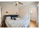 Light bedroom features hardwood floors and decorative lighting at 3384 W 29Th Ave, Denver, CO 80211