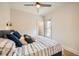 Cozy bedroom showcases a ceiling fan and an abundance of natural light at 3384 W 29Th Ave, Denver, CO 80211